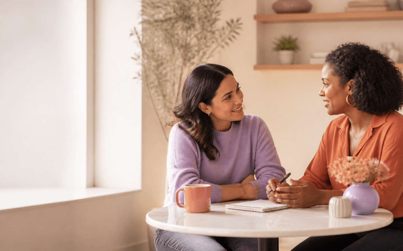 Two people having a thoughtful business conversation