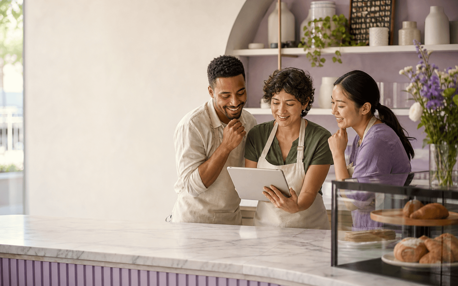 Small-business owners collaborating in their bakery